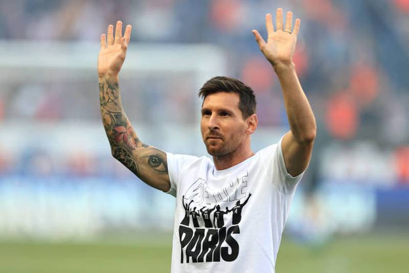 Lionel Messi of Paris Saint-Germain acknowledges the fans as he is introduced to the fans prior to the Ligue 1 Uber Eats match between Paris Saint Germain and Strasbourg at Parc des Princes in Paris, France.
