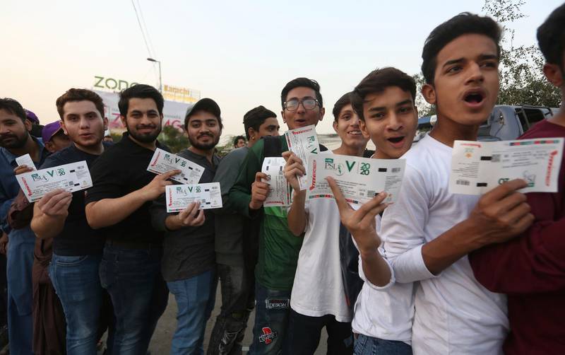 Pakistan fans wait for the opening match of PSL in Karachi on Thursday. AP
