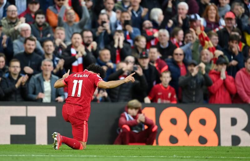 Mohamed Salah of Liverpool celebrates after scoring his side's second goal 2-2 Premier League draw against Manchester City at Anfield on October 3, 2021. Getty Images