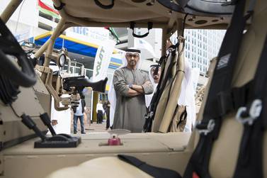 Sheikh Mohammed bin Zayed, Crown Prince of Abu Dhabi and Deputy Supreme Commander of the Armed Forces, views a vehicle at the Al Masaood Automobiles stand at the 2017 International Defence Exhibition and Conference. Hamad Al Kaabi / Crown Prince Court – Abu Dhabi