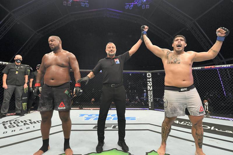 ABU DHABI, UNITED ARAB EMIRATES - OCTOBER 04:  (R-L) Carlos Felipe of Brazil reacts after defeating Yorgan De Castro of Cape Verde in their heavyweight bout during the UFC Fight Night event inside Flash Forum on UFC Fight Island on October 04, 2020 in Abu Dhabi, United Arab Emirates. (Photo by Josh Hedges/Zuffa LLC)