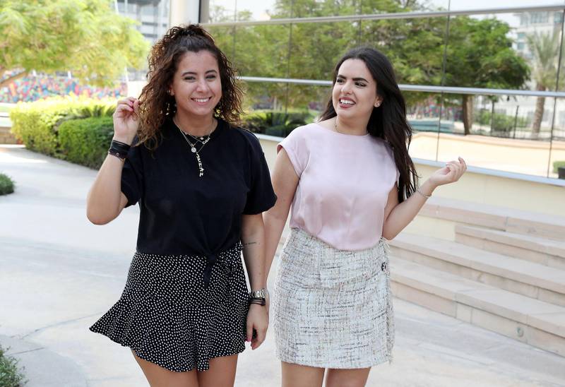 DUBAI,  UNITED ARAB EMIRATES , OCTOBER 14  – 2019 :- Maram Hussein ( right ) and Lana Makhzoumi ( left ) , co-hosts of one of the most popular podcasts in the Middle East  DXBabies at the Media City Park in Dubai. ( Pawan Singh / The National ) For Arts. Story by Ann Marie McQueen