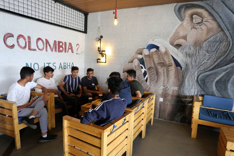 Saudi youth sit in a coffee shop at Abha High City,  Abha, Saudi Arabia. Reuters