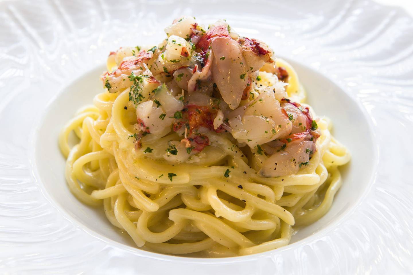 Die Tonnarelli cacio e pepe mit roten Garnelen bei Boccone.  Foto: Hotel Amigo