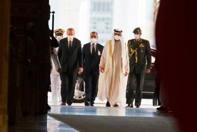 President Erdogan and Sheikh Mohamed bin Zayed arrive at Qasr Al Watan in Abu Dhabi. AP Photo / Jon Gambrell