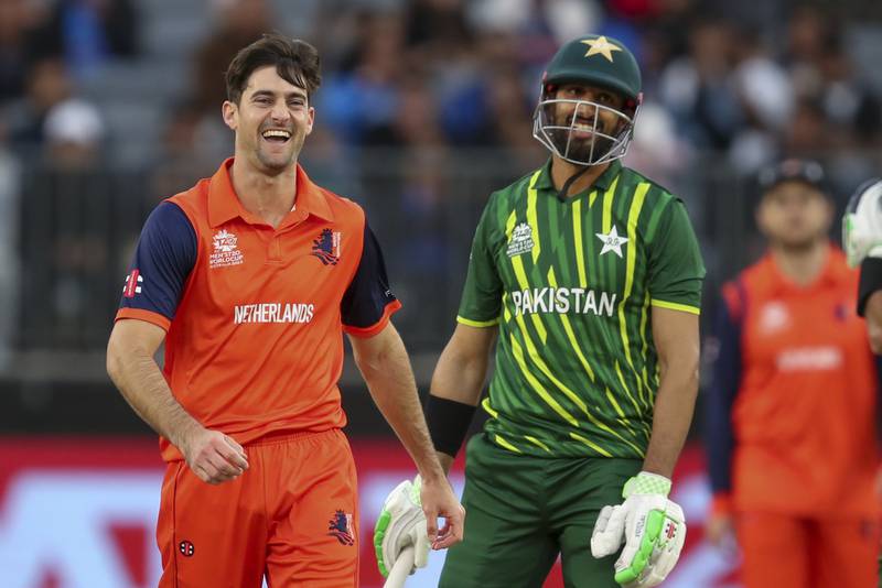 Netherlands' Brandon Glover, left, after taking the wicket of Pakistan's Shan Masood. AP