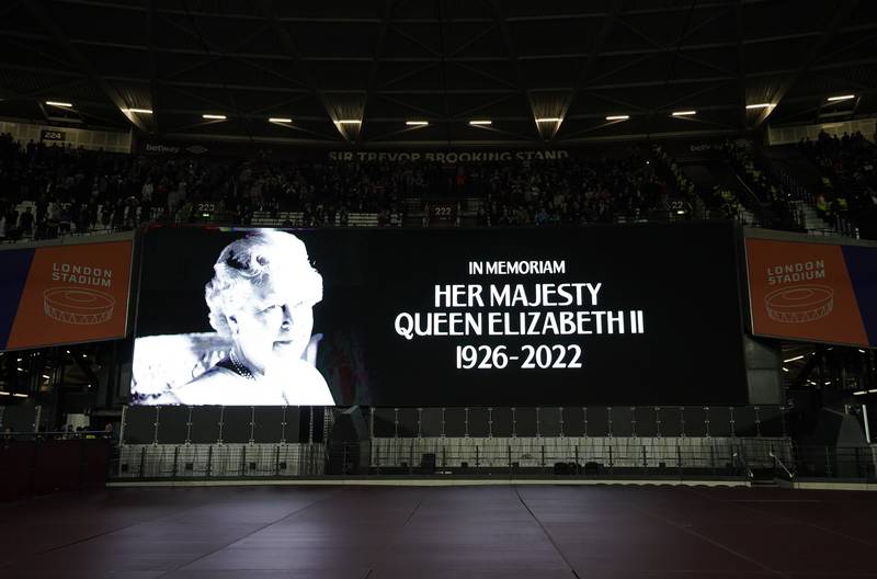 The big screen displays a message in memoriam at the London Stadium. PA