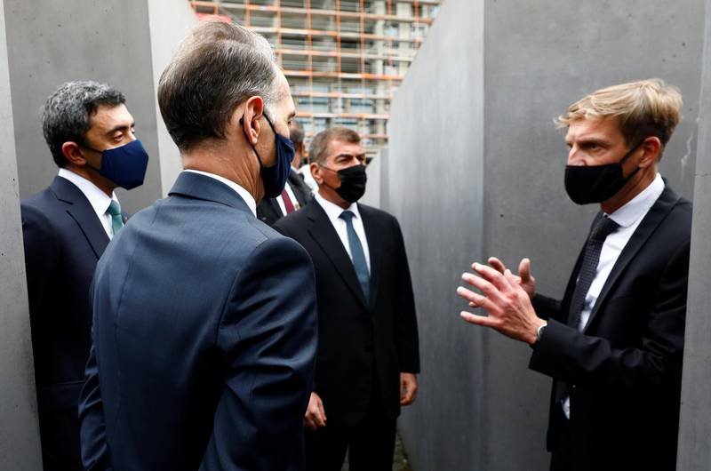 Sheikh Abdullah bin Zayed and his Israeli counterpart Gabi Ashkenazi visit the Holocaust memorial together with German Foreign Minister Heiko Maas prior to their historic meeting in Berlin, Germany. Reuters