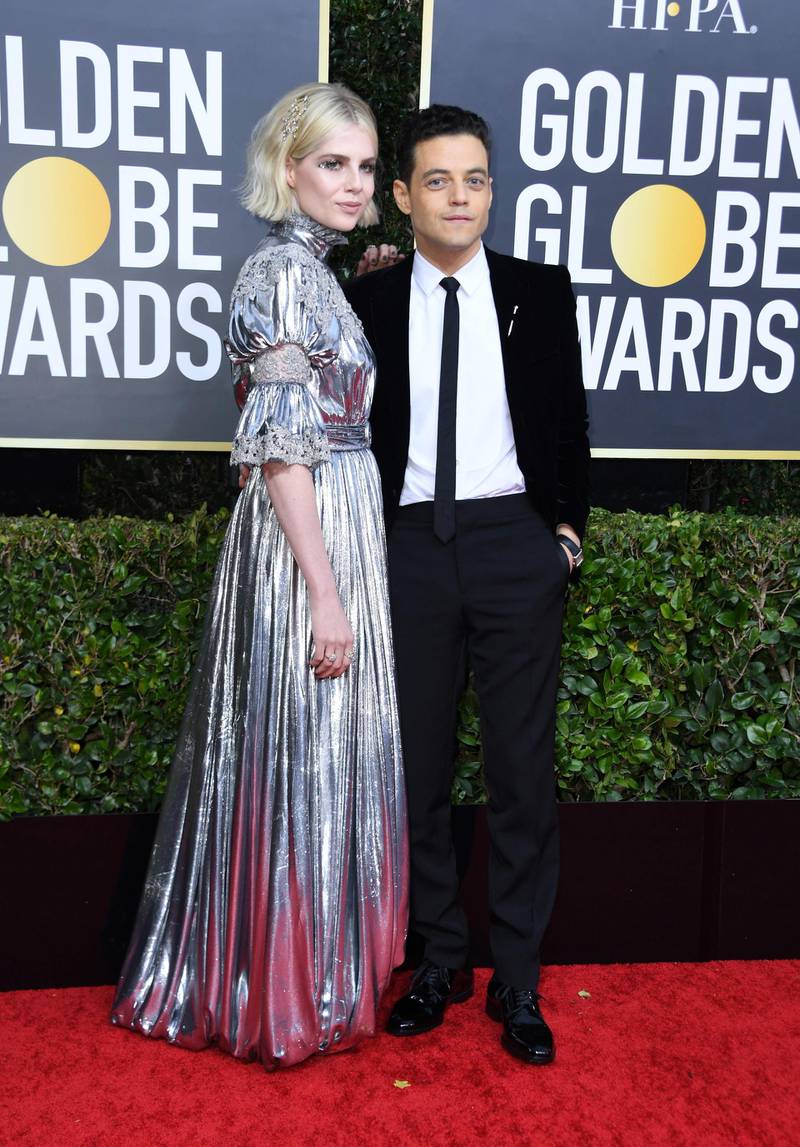 US-Egyptian actor Rami Malek and actress Lucy Boynton arrive for the 77th annual Golden Globe Awards.  AFP