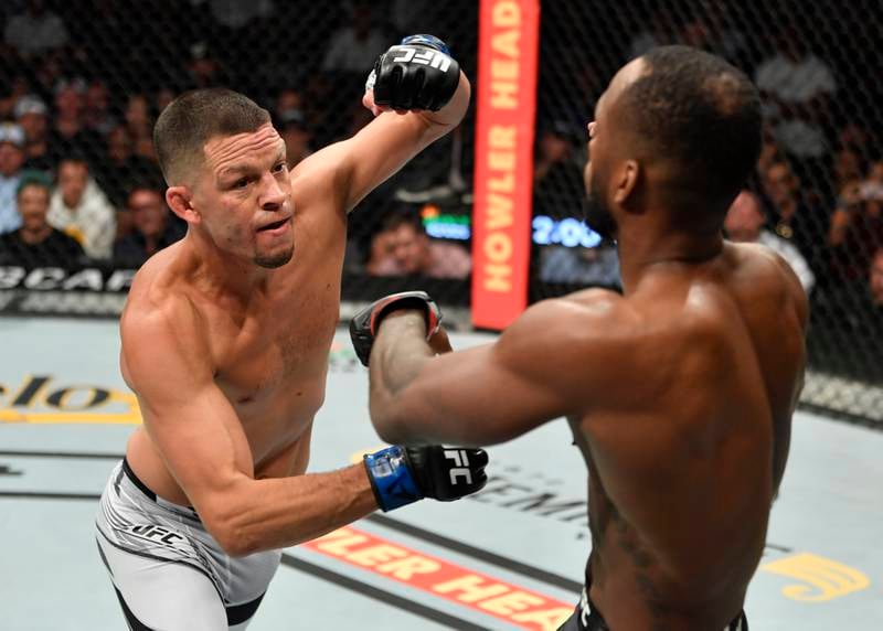 Nate Diaz punches Leon Edwards in their welterweight fight during the UFC 263 in Arizona. Zuffa LLC