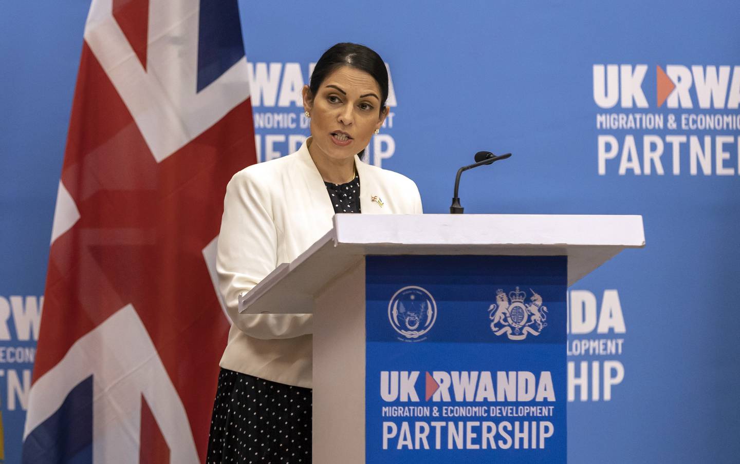 Britain's Home Secretary Priti Patel speaks to the media after signing what the two countries called an "economic development partnership" in Kigali, Rwanda. AP Photo