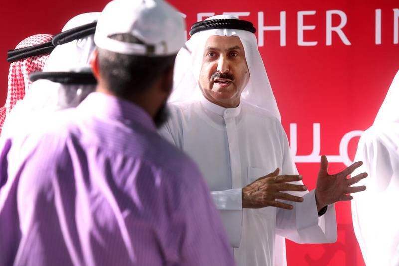 Saqr Ghobash, Minister of Human Resources and Emiratisation, took the Know Your Rights message to Mussaffah and urged workers there to learn and foster a sense of harmony. Delores Johnson / The National