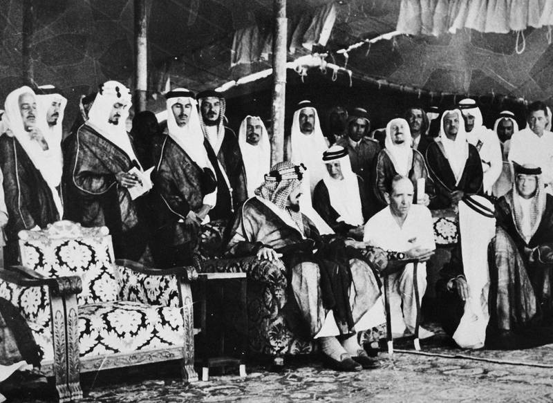Founder of Saudi Arabia, King Abdelaziz, speaks to the general manager of Aramco, N. Devins, during the opening ceremony of the Riyadh-Dammam train link in October 1951 in Riyadh. Photo: AFP