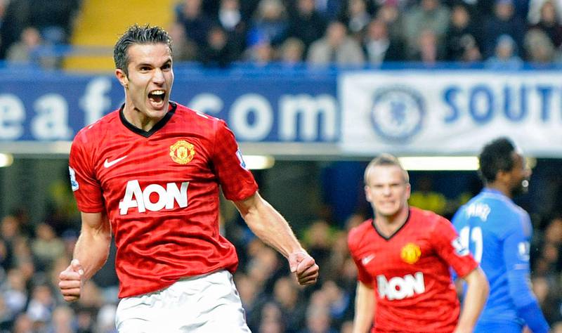 epa03450720 Manchester United's Robin van Persie (L) celebrates scoring their second goal against Chelsea during the English Premier League soccer match between Chelsea and Manchester United at Stamford Bridge, London, Britain, 28 October 2012.  EPA/GERRY PENNY DataCo terms and conditions apply.  http//www.epa.eu/downloads/DataCo-TCs.pdf *** Local Caption ***  03450720.jpg