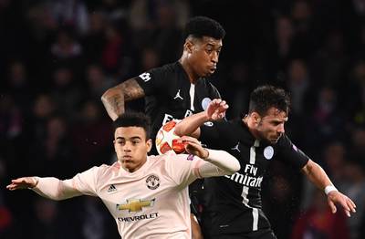 Manchester United forward Mason Greenwood, left, fights for the ball with Paris Saint-Germain's French defender Presnel Kimpembe. AFP