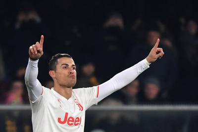 Cristiano Ronaldo celebrates after scoring his goal during the Italian Serie A football match against Hellas Verona. AFP