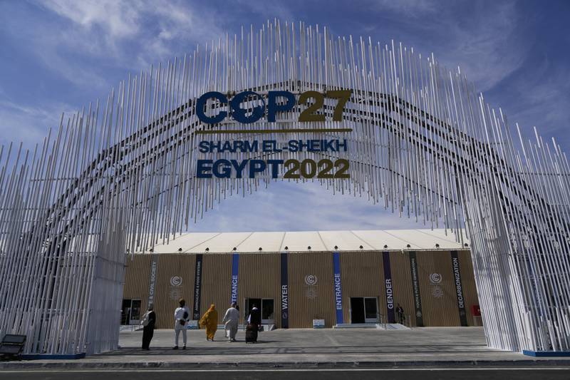 Guests enter the convention center hosting the COP27 U.N.  Climate Summit. AP Photo