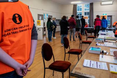 Voters stand in line at the Aro Valley Community Centre polling station during the New Zealand General Election in Wellington. Bloomberg