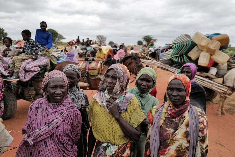Sudanese women who fled the conflict in their country wait to be registered by the United Nations High Commissioner for Refugees upon crossing the border into Chad. Reuters