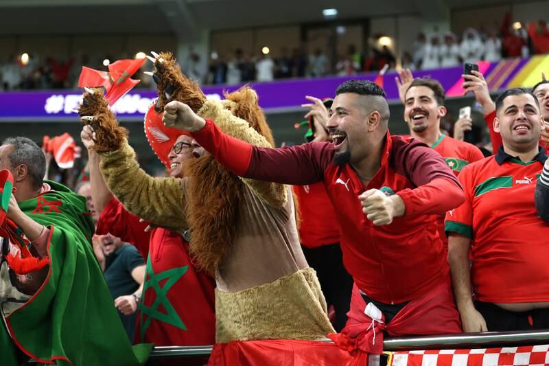 Morocco fans celebrate the opening goal against Portugal at Al Thumama Stadium. Getty Images