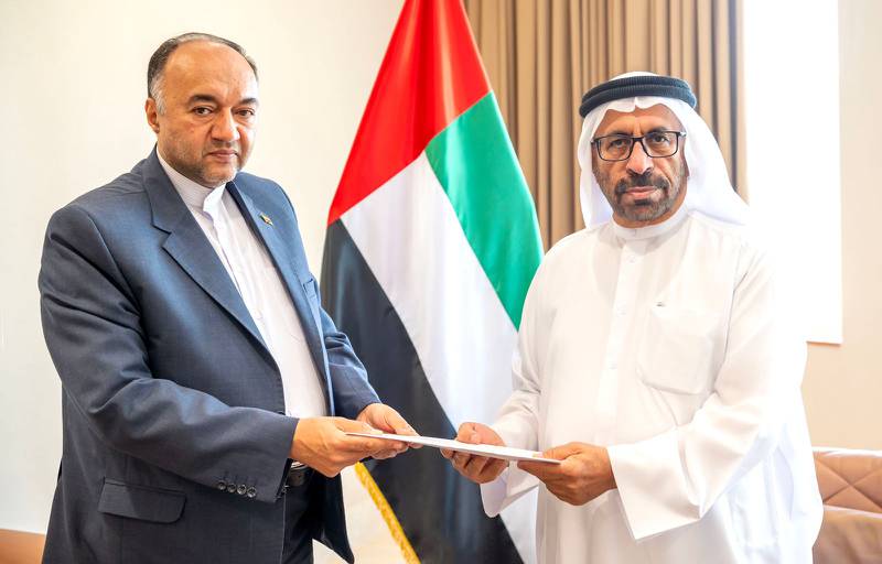 Khalifa Al Marar, Minister of State, receives a letter of invitation for President Sheikh Mohamed from Reza Amiri, Iran's Ambassador to the UAE. Photo: Wam 

