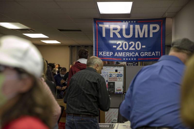 BLOOMFIELD HILLS, MI - NOVEMBER 06: Supporters of U.S. President Donald Trump gather inside the Oakland GOP office waiting to hear Republican National Committee Chairwoman Ronna McDaniel speak during the Trump Victory press conference on November 6, 2020 in Bloomfield Hills, Michigan. Three days after the U.S. presidential election, Democratic nominee Joe Biden's vote count continued to grow nationwide as protesters staged demonstrations outside vote counting centers.   Elaine Cromie/Getty Images/AFP
== FOR NEWSPAPERS, INTERNET, TELCOS & TELEVISION USE ONLY ==
