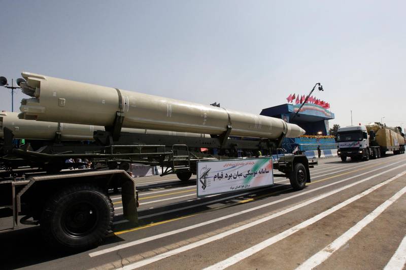FILE - In this Friday, Sept. 21, 2012 file photo, a Qiam missile is displayed by Iran's Revolutionary Guard during a military parade commemorating the start of the Iraq-Iran war in front of the mausoleum of the late revolutionary founder Ayatollah Khomeini just outside Tehran, Iran. Saudi Arabia and the U.S. now accuse Iran of supplying ballistic missiles to Shiite rebels in Yemen, including this model. (AP Photo/Vahid Salemi, File)