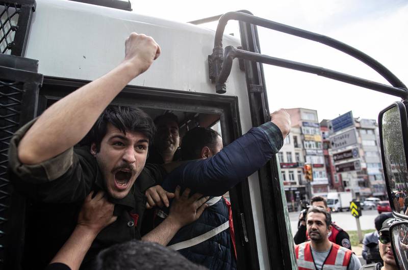 Protesters are arrested by riot police in Taksim Square for an illegal May Day rally  in Istanbul.  EPA