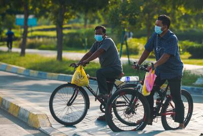 Abu Dhabi, United Arab Emirates, June 24, 2020.   FOR:  Standalone / Stock Images-- Abu Dhabi resdents on their bikes along the corniche during the Covid-19 pandemic.Victor Besa  / The NationalSection:  NAReporter:  none