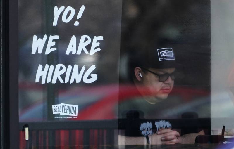 A hiring sign at a restaurant in Schaumburg, Illinois. AP