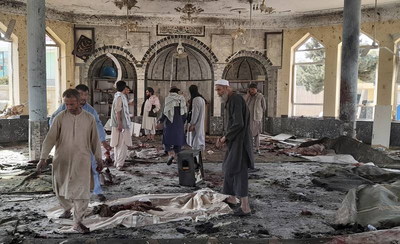 People view the damage inside a mosque following a bombing in Kunduz, northern Afghanistan, on Friday. All photos: AP Photo / Abdullah Sahil