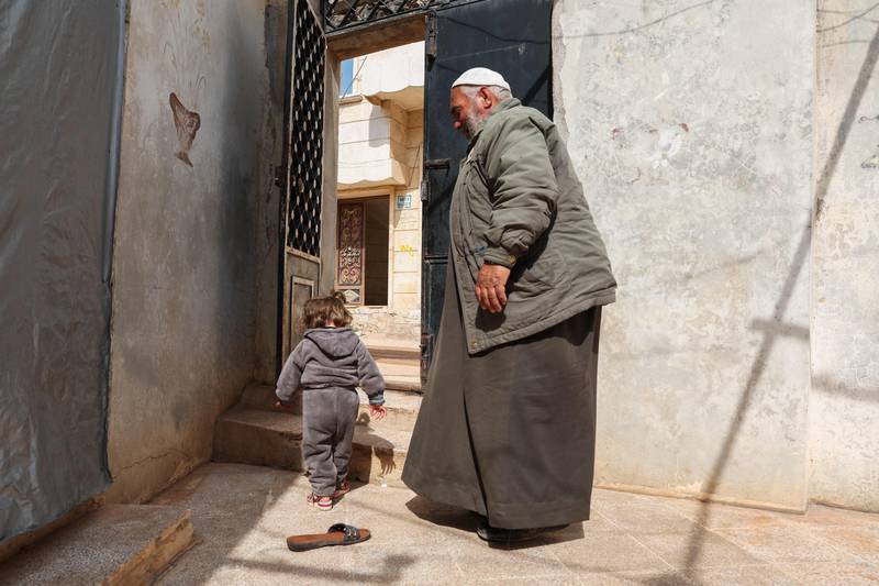 Ibrahim Othman with Hibatullah, 3, who calls him Grandpa. AFP