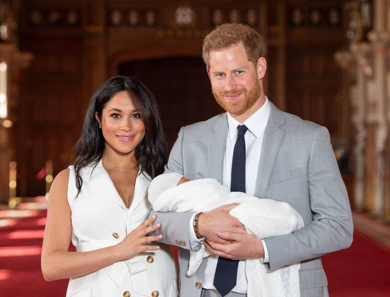 Meghan and Prince Harry pose with their newborn son Archie Harrison Mountbatten-Windsor at Windsor Castle in May 2019. Getty Images