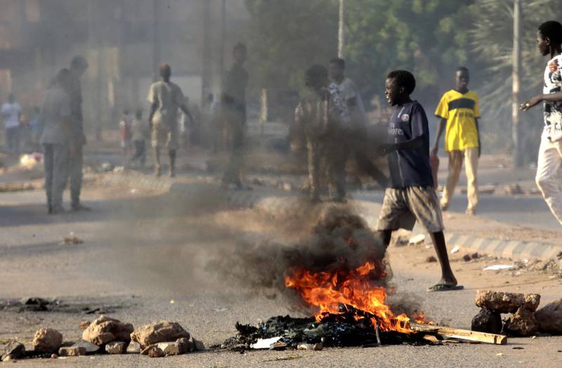 Tyres are set ablaze by Sudanese protesters. AFP