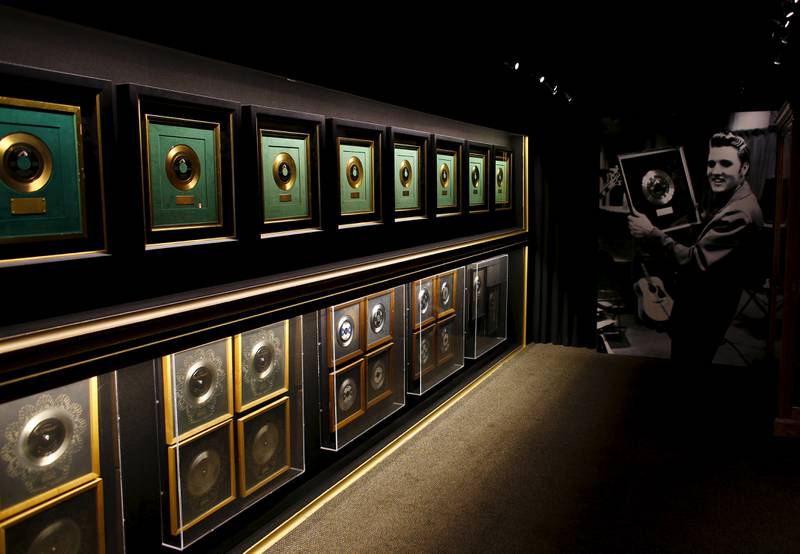 Gold records line the walls of Elvis Presley's trophy room. Reuters