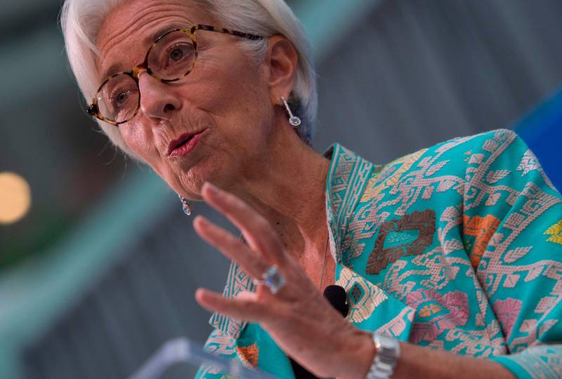 The International Monetary Fund (IMF) managing director, Christine Lagarde speaks during opening remarks for the upcoming 2018 General IMF Meetings in Washington, DC on October 1, 2018. After sounding the alarm in recent years about threats to the global economy, International Monetary Fund chief Christine Lagarde said risks had begun to materialize and were slowing growth. / AFP / ANDREW CABALLERO-REYNOLDS
