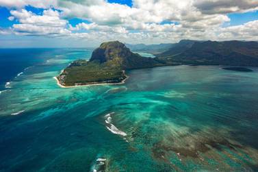 Mauritius will offer long-term visitors free Covid-19 vaccinations. Unsplash