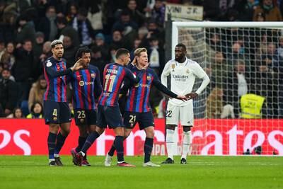 Barcelona players celebrate at the final whistle. Getty Images
