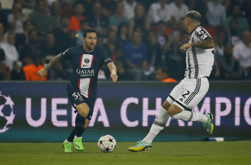PSG's Lionel Messi in action with Juventus' Leandro Paredes. Reuters
