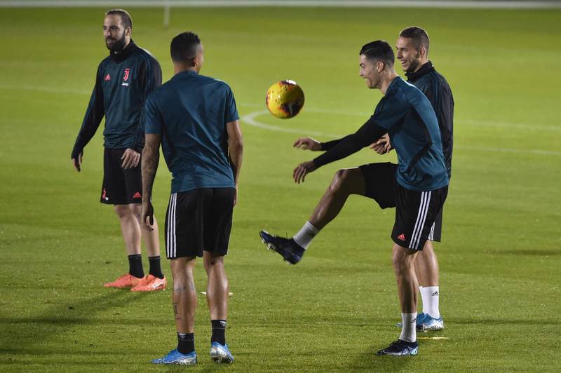 Ronaldo juggles the ball during a training session in Saudi capital Riyadh on the eve of the Supercoppa Italiana final football match between Juventus and Lazio. AFP