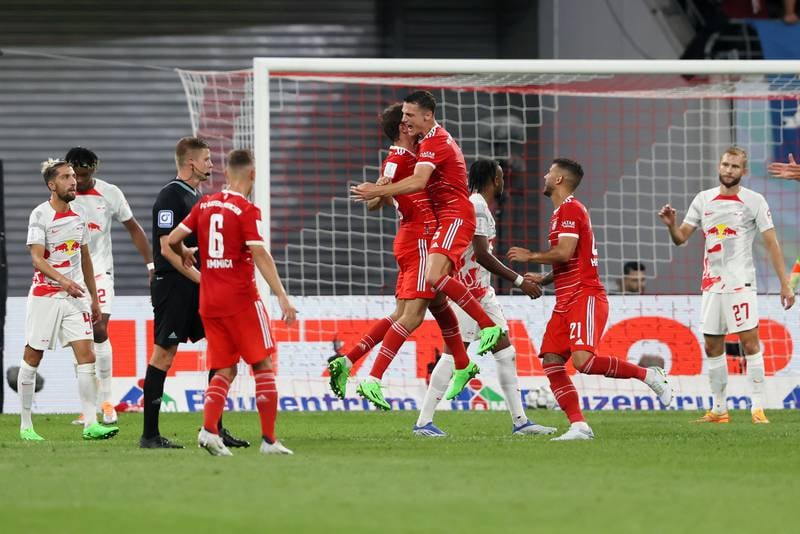 Benjamin Pavard of Bayern Munich celebrates scoring their side's third goal with teammates. Getty Images