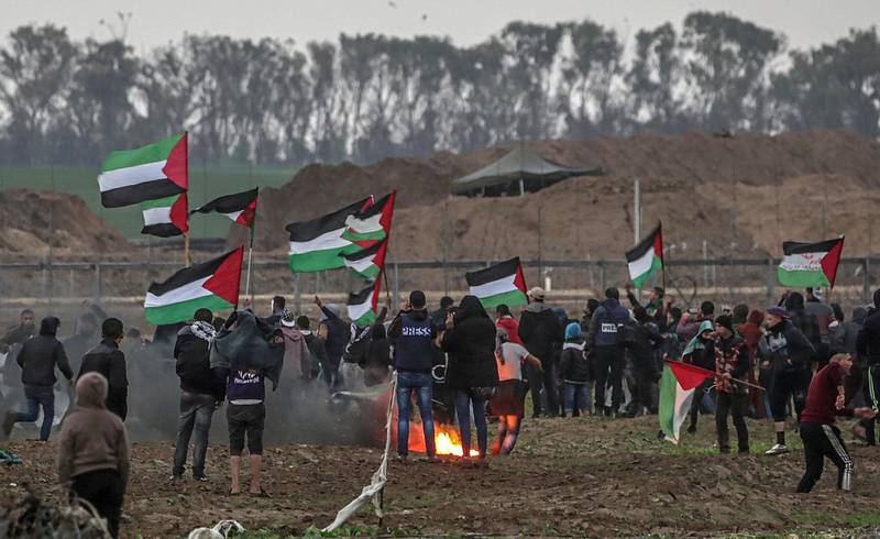 Palestinian protesters during a demonstration near the border between Israel and Gaza Strip. EPA