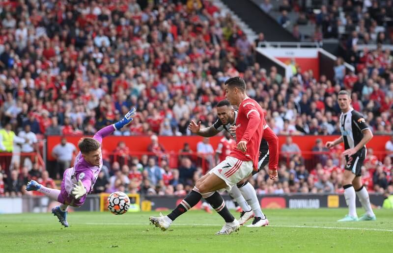 Cristiano Ronaldo scores for Manchester United against Newcastle United during the Premier League match at Old Trafford in September, 2021. Getty