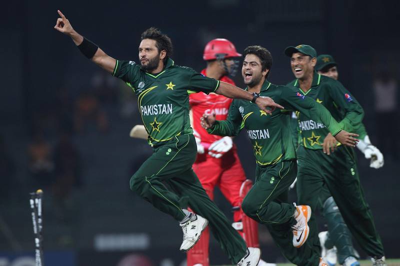 COLOMBO, SRI LANKA - MARCH 03: Shahid Afridi (L) of Pakistan celebrates taking the wicket of Harvir Baidwan during the Canada v Pakistan 2011 ICC World Cup Group A match at the R. Premadasa Stadium on March 3, 2011 in Colombo, Sri Lanka.  (Photo by Michael Steele/Getty Images)