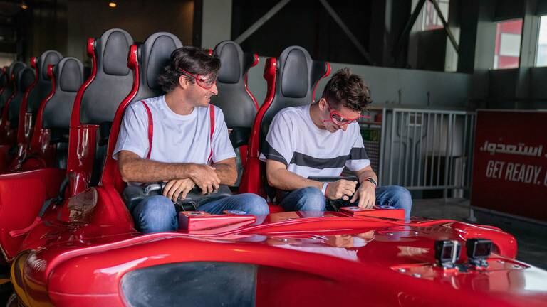 An image that illustrates this article Charles Leclerc and Carlos Sainz visit Ferrari World Abu Dhabi - in pictures