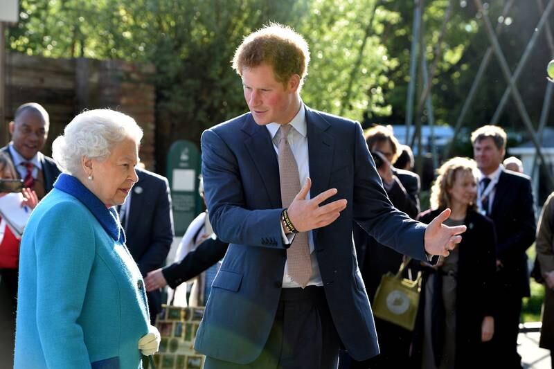 Queen Elizabeth and her grandson Prince Harry attend the 2015 show. Getty Images