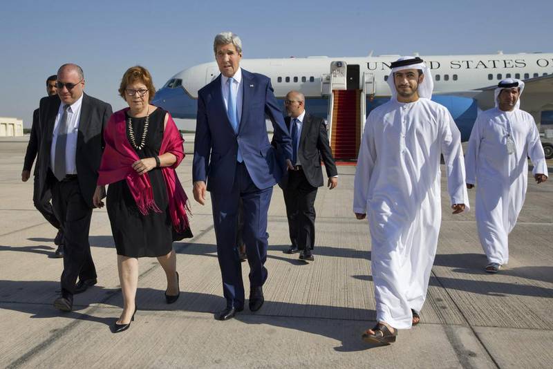 Ms Leaf welcomes John Kerry, the US secretary of state at the time, to Abu Dhabi during her time as ambassador to the UAE. AP 