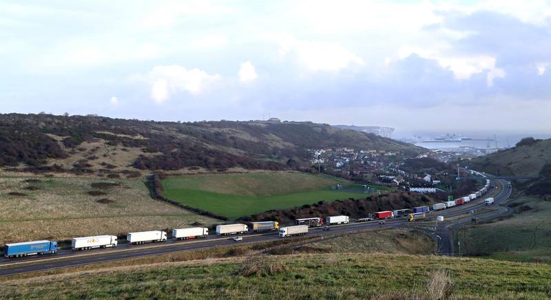 Lorries queue for the Port of Dover along the A20 in Kent, England. AP Photo