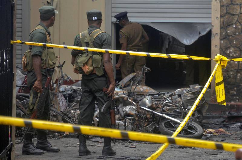 Sri Lankan military stand guard near the explosion site at a church in Batticaloa. Reuters