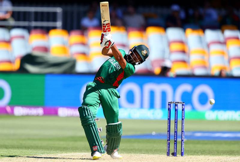 Najmul Hossain Shanto plays a shot over the boundary line for six runs. AFP